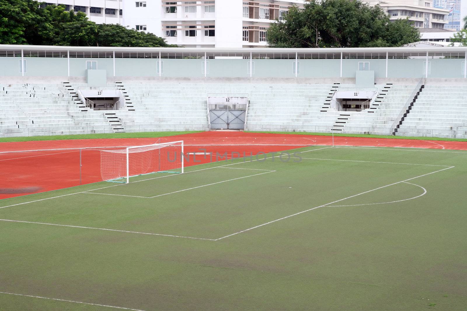 soccer football goal with penalty area on fake grass pitch