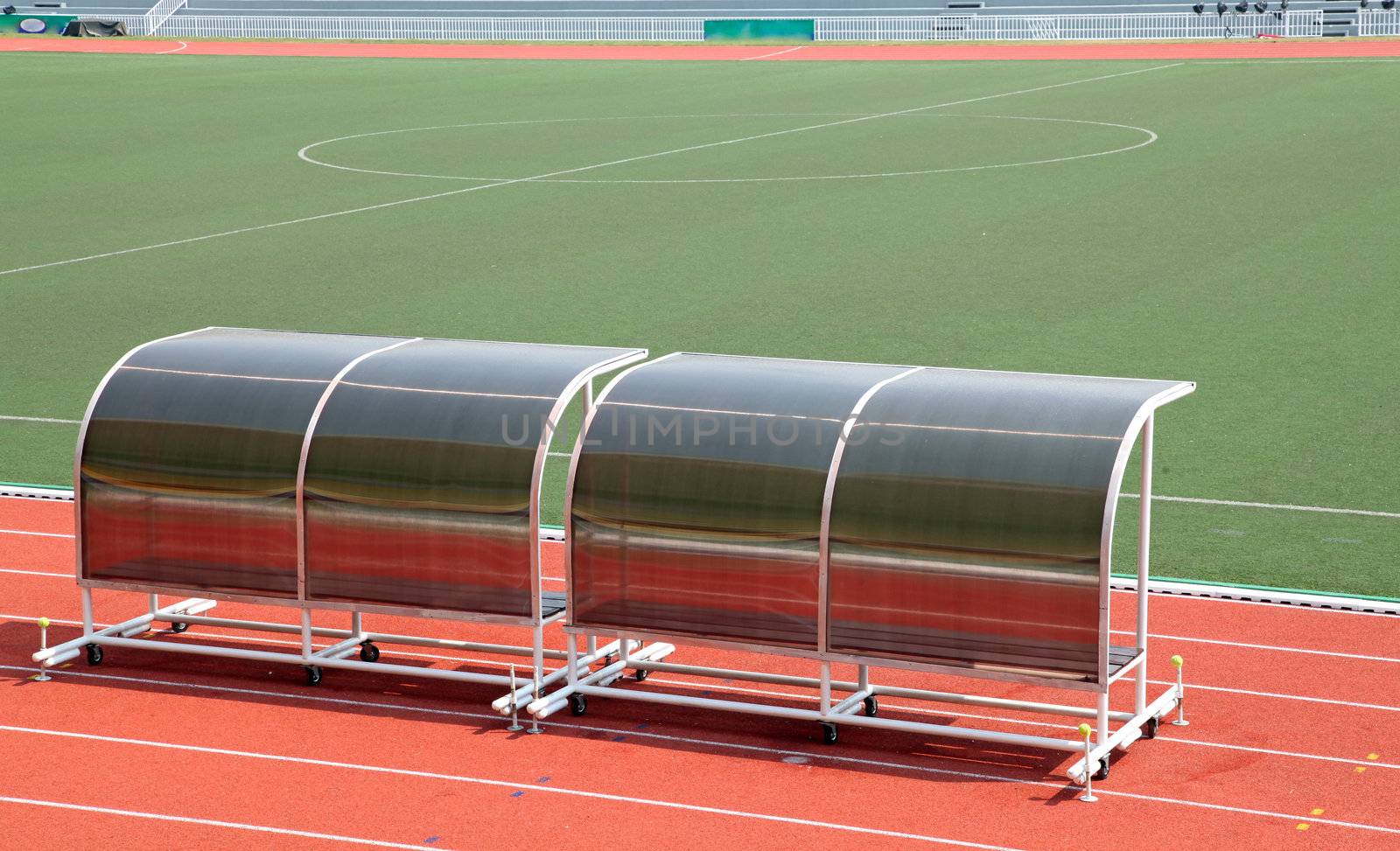 Coach and reserve benches in football stadium