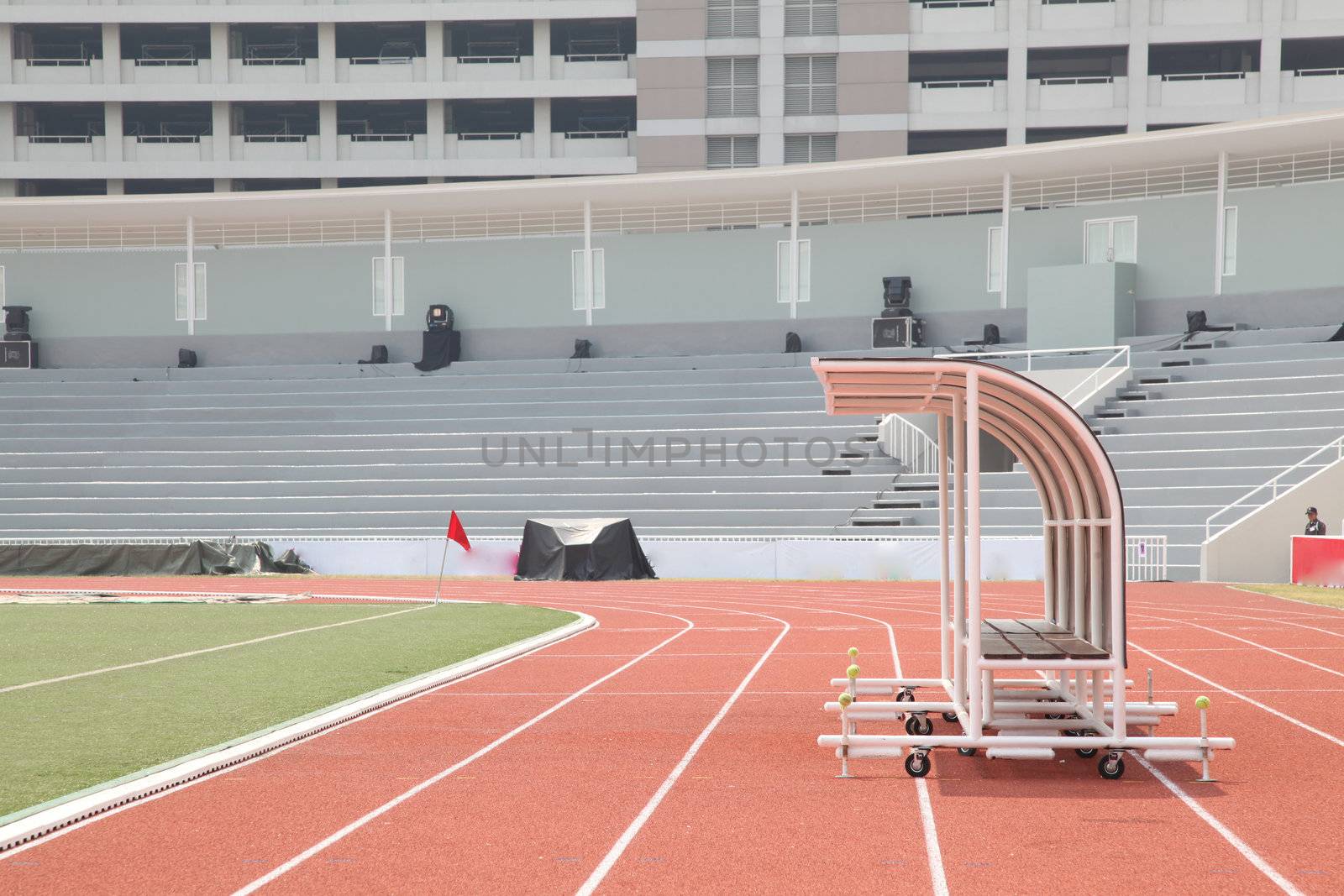 Coach and reserve benches in soccer stadium side view