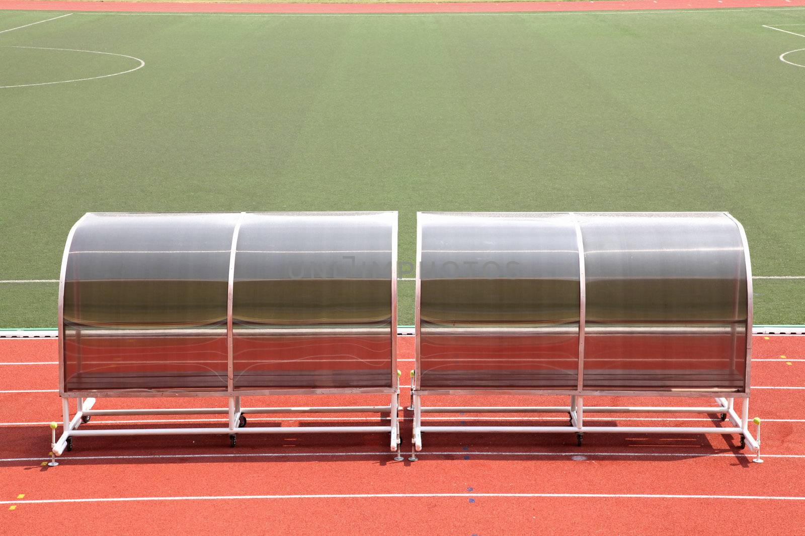 Coach and reserve benches in football soccer stadium