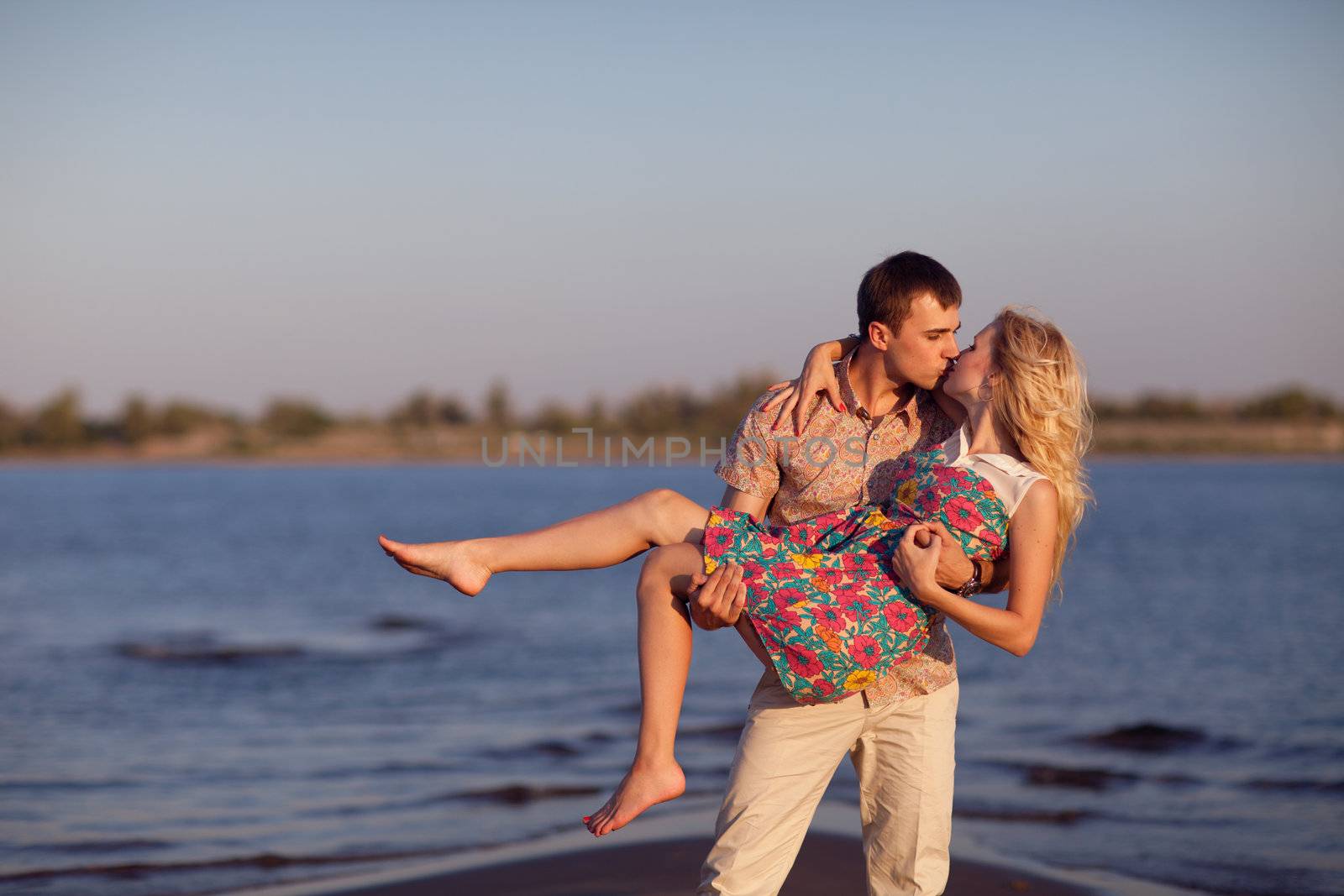 couple on the beach by vsurkov