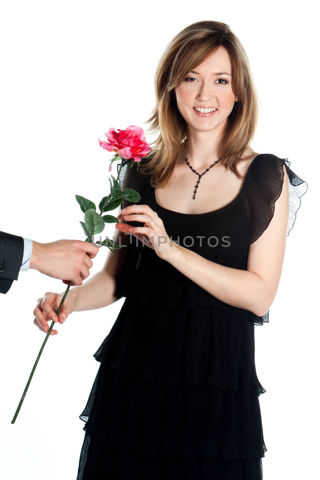 portrait of a young and beautiful girl with a gift and a rose