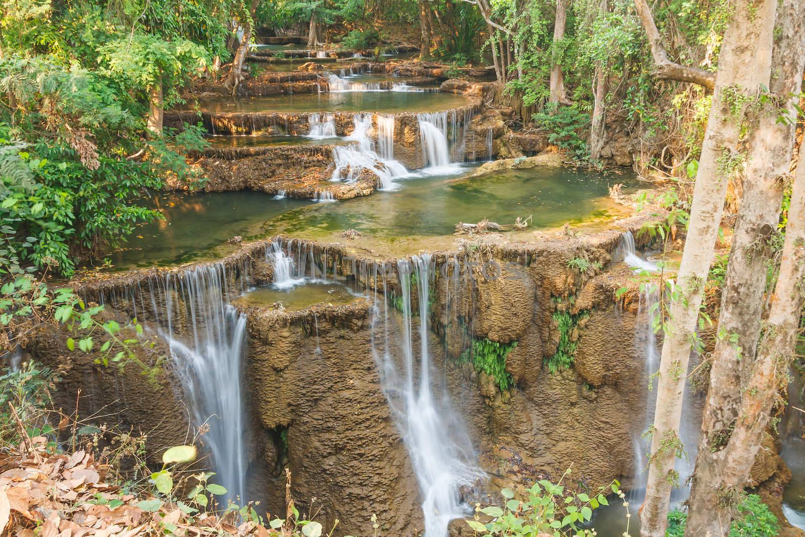 Waterfall in National Park , Kanchanaburi Province , Thailand  by jame_j@homail.com