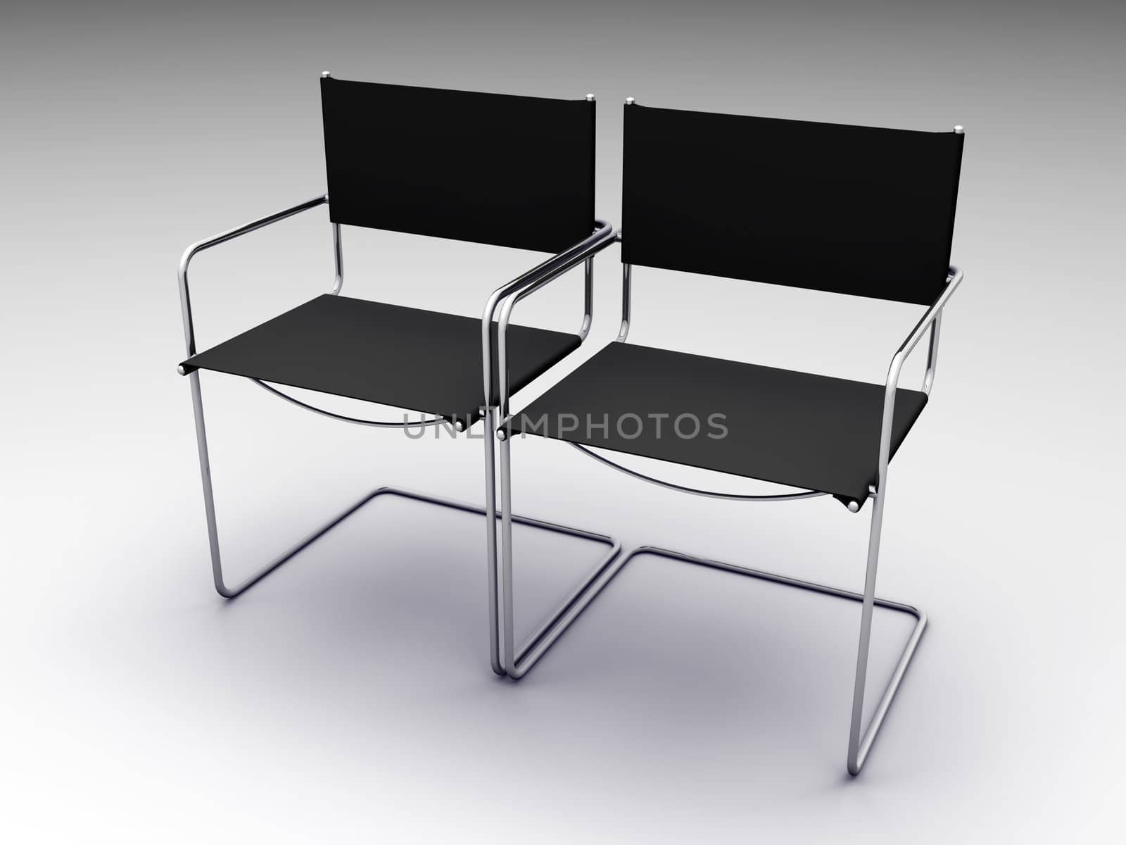 two black chairs on grey background