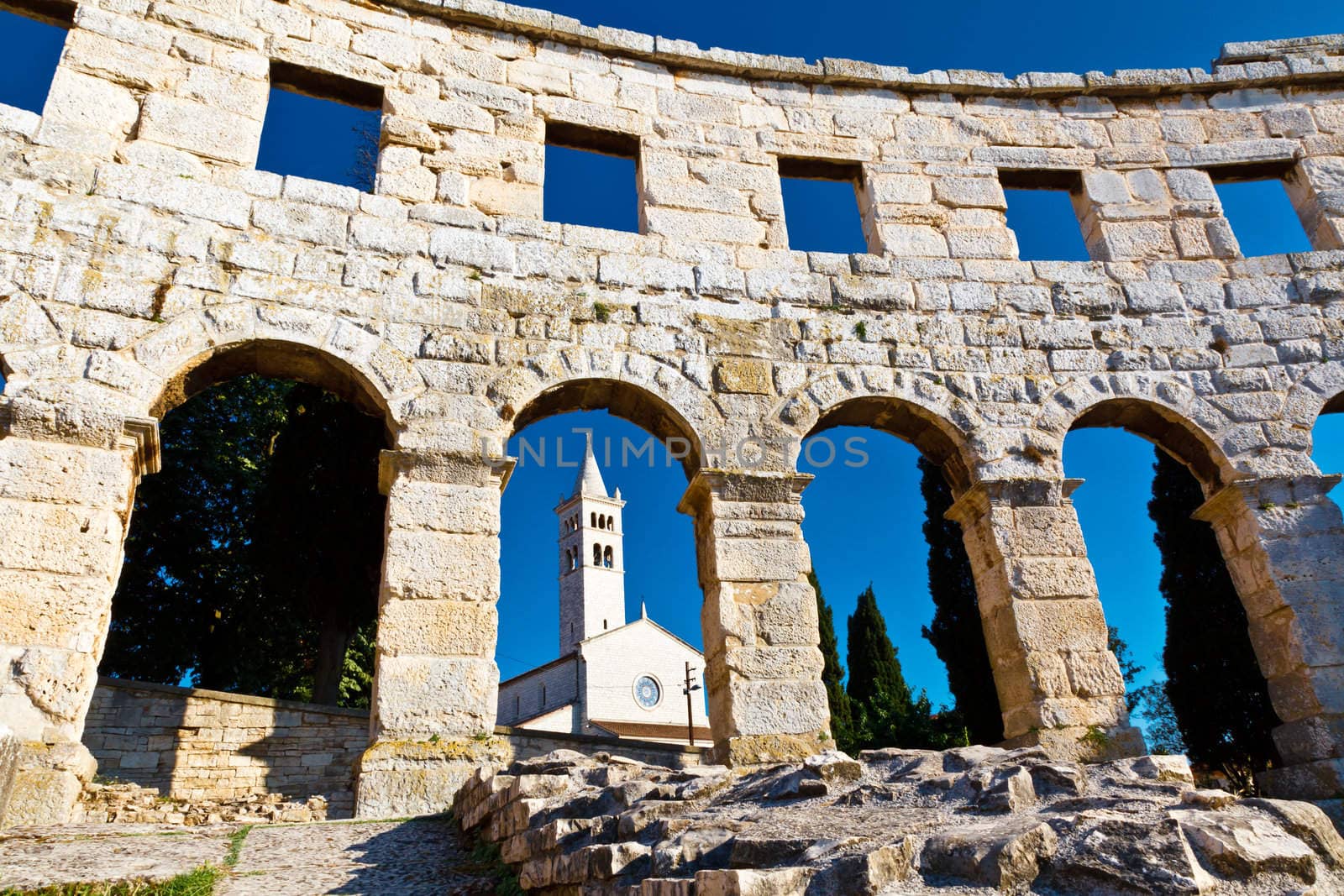 Ancient Roman Amphitheater and Church in Pula, Istria, Croatia by anshar