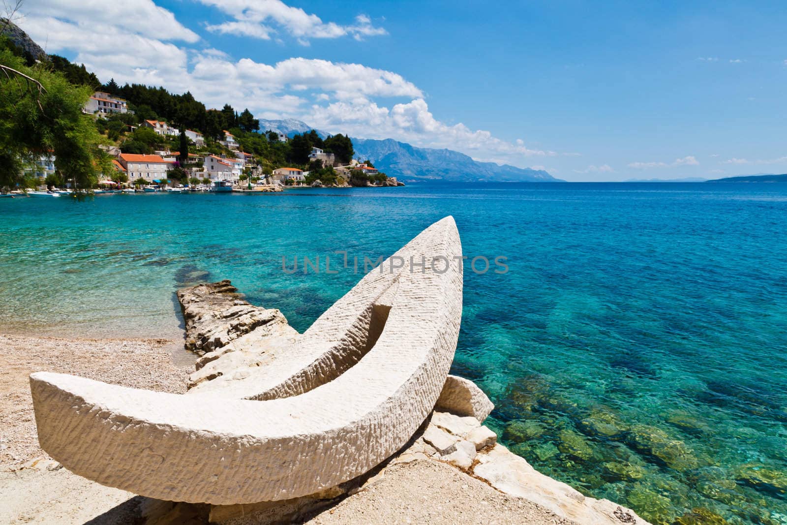White Boat and Azure Adriatic Bay in Croatia