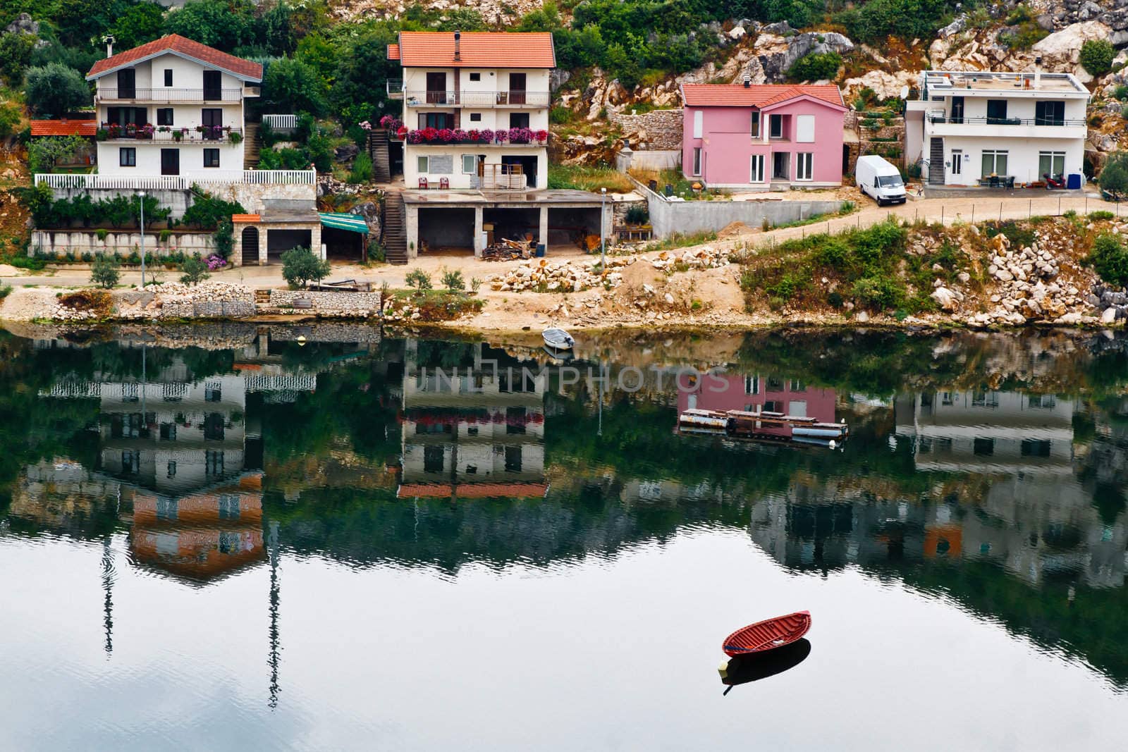 Boat and the Town Ploce in Croatia