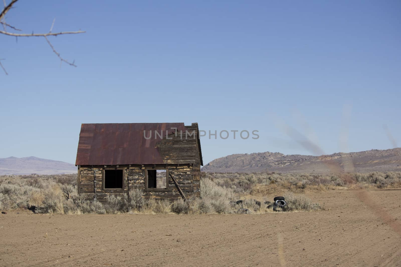 an old rusty shack in the desert.