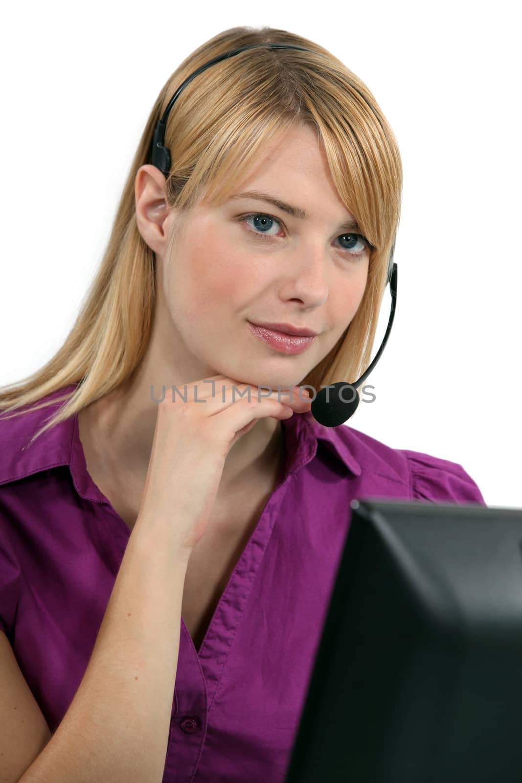businesswoman wearing headset by phovoir