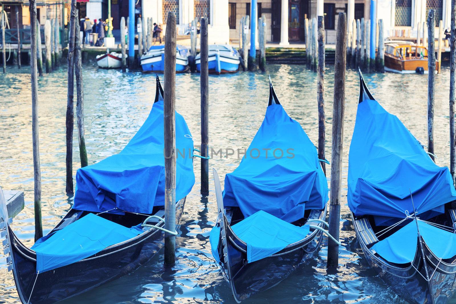 Three gondolas in Venice, Grand Canal, Italy. 