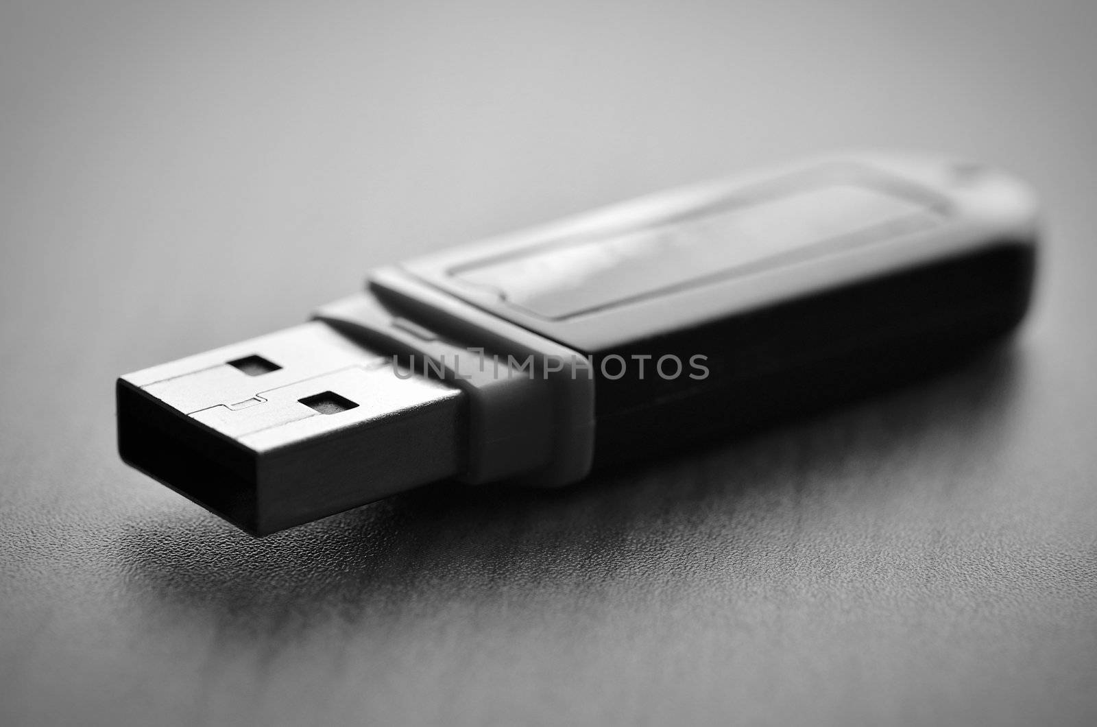 Close up of a pendrive on wood with soft focus