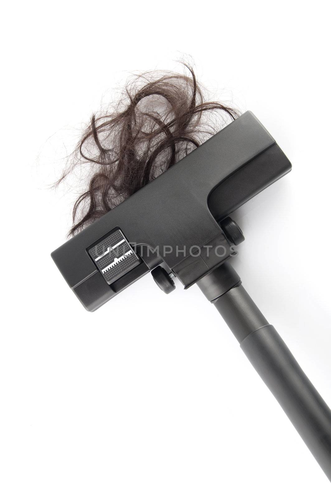 Vacuum cleaning fall hair on white background