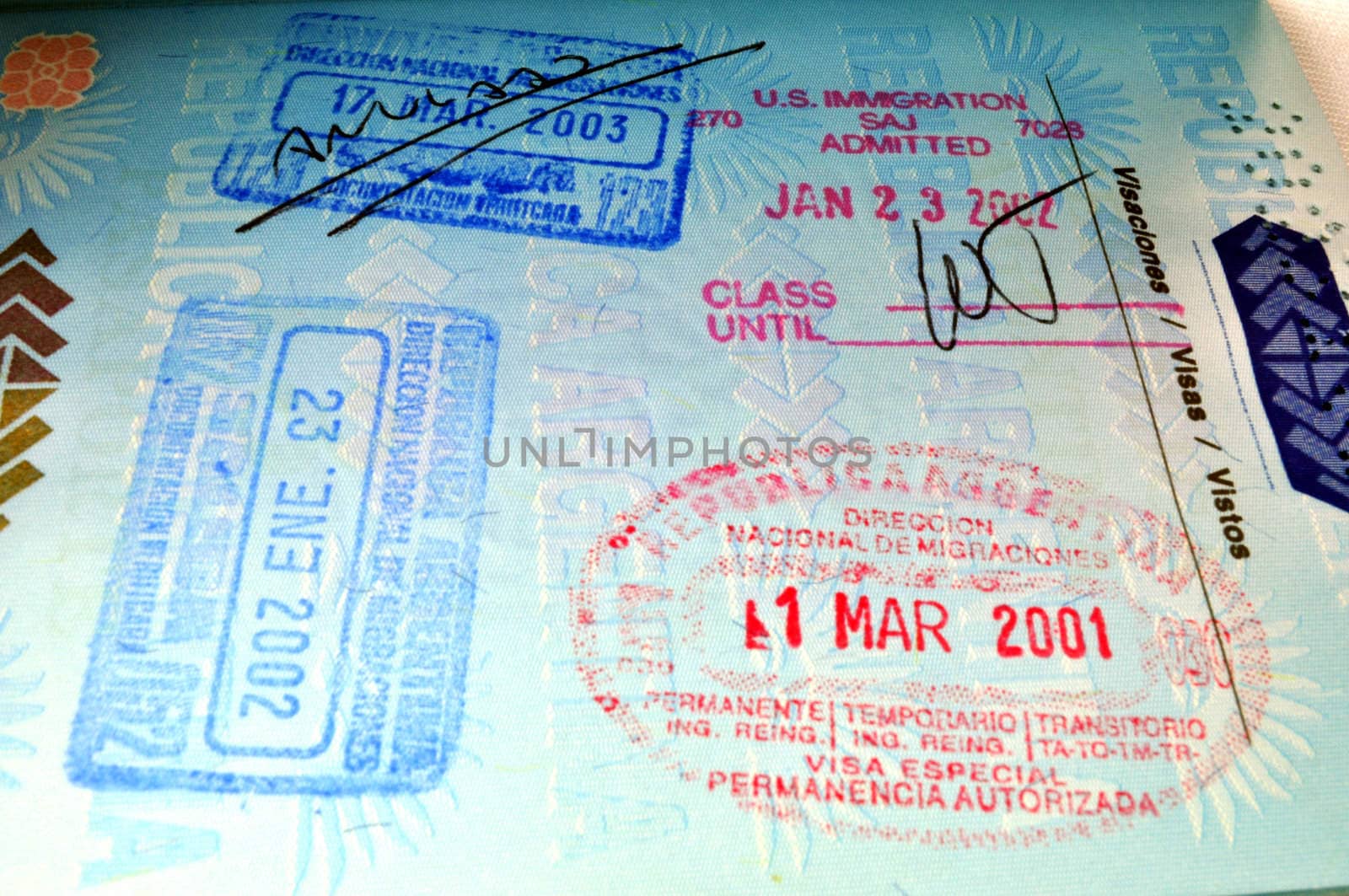 Migration stamps on passport.