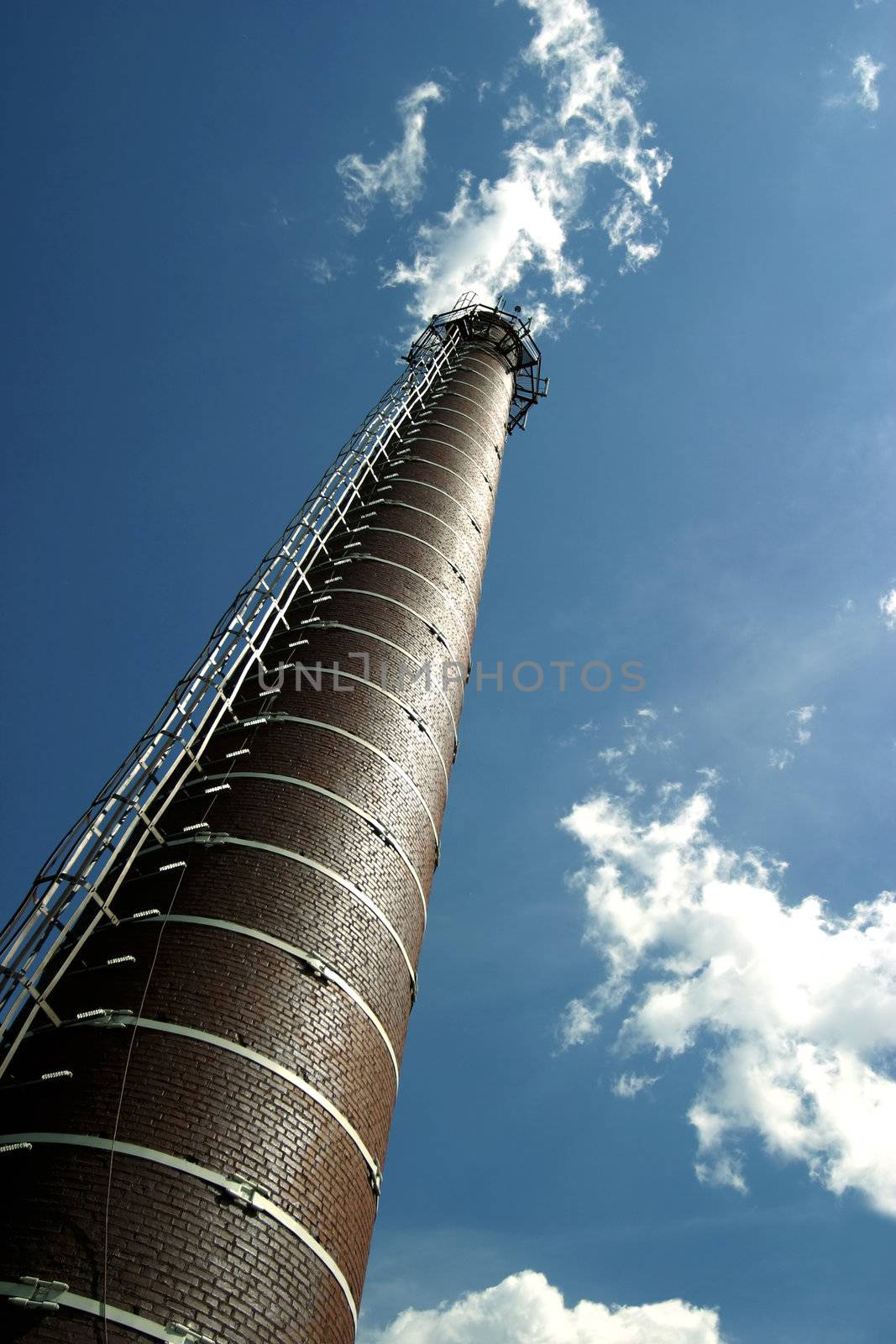 Factory details on a background of the sky