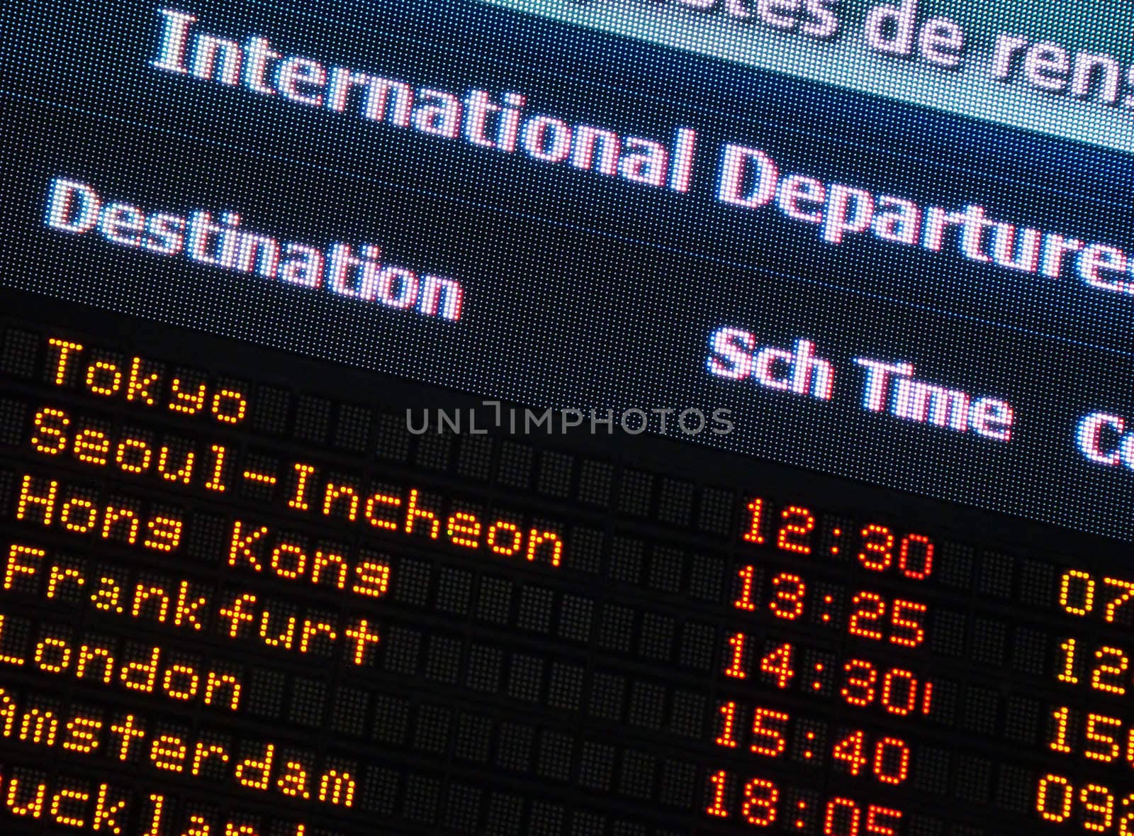 Canadian airport information board, international departures.