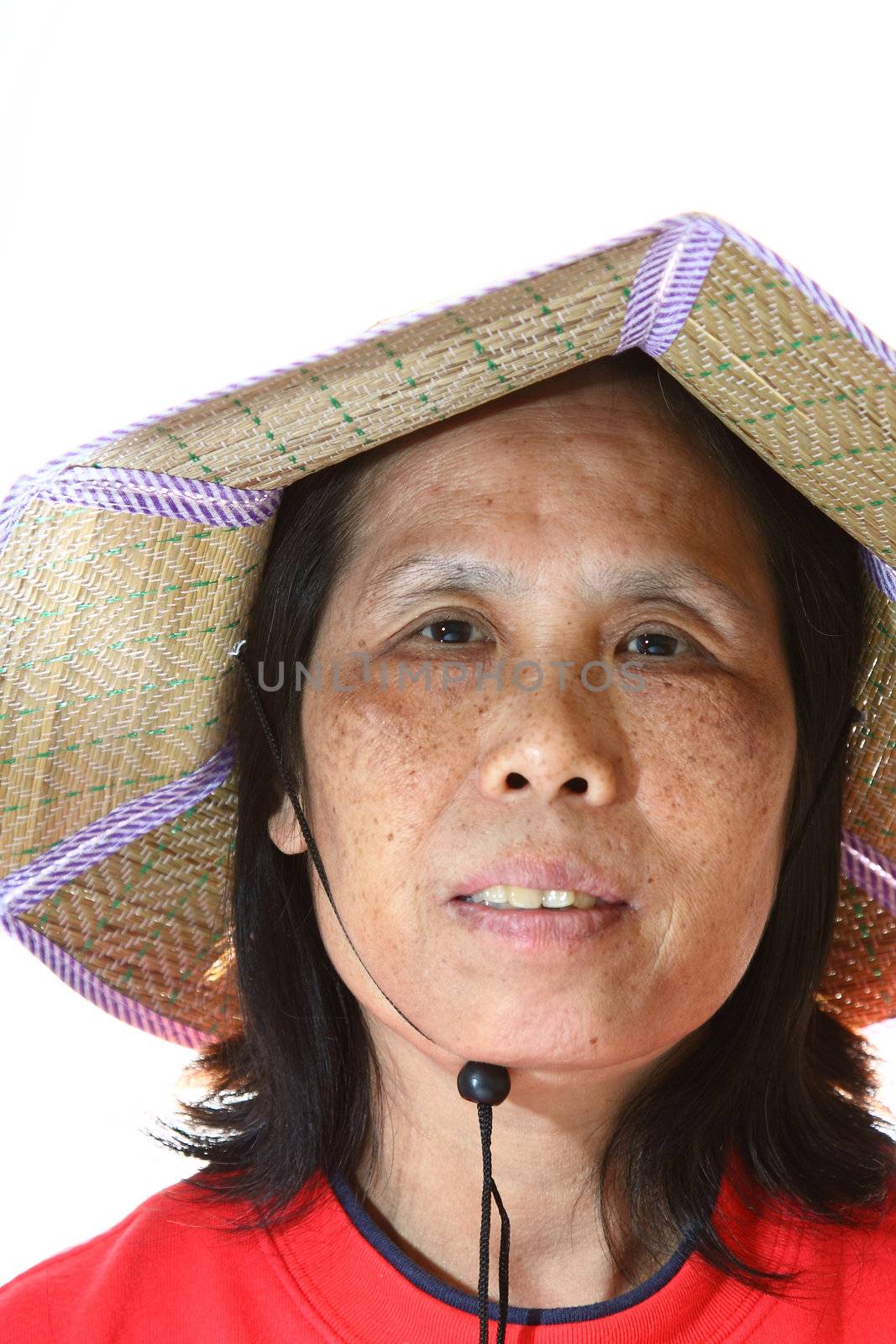 A 50s asian woman wearing hat