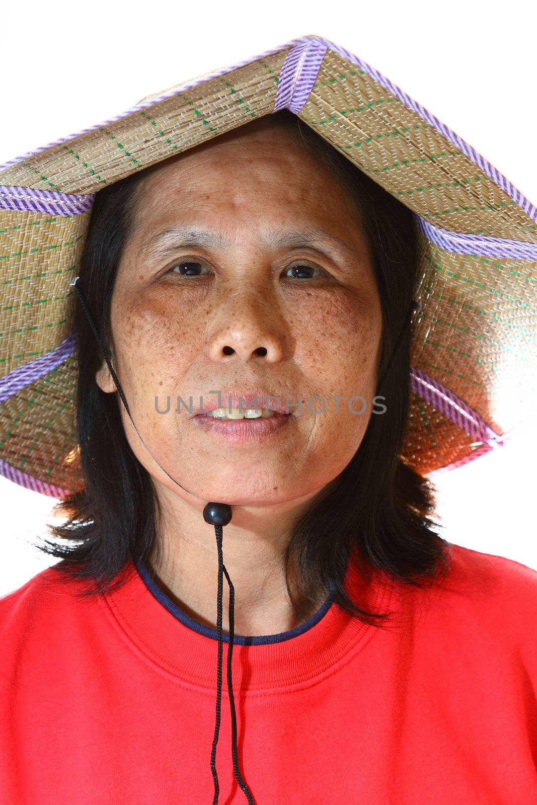 A 50s asian woman wearing hat