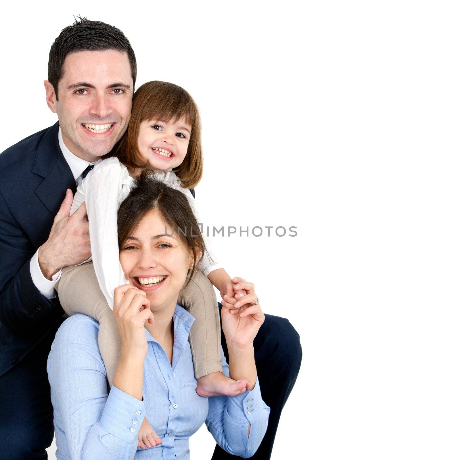 Portrait of young couple having fun with their daughter. Isolated on white background.