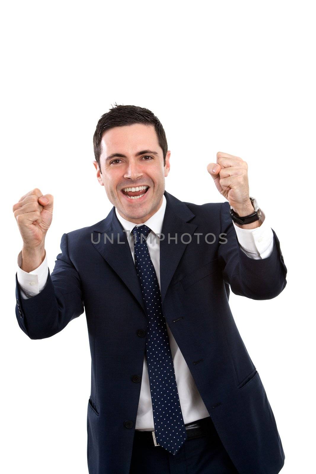Handsome young business man in blue suit expressing a cry for victory. Isolated on white.