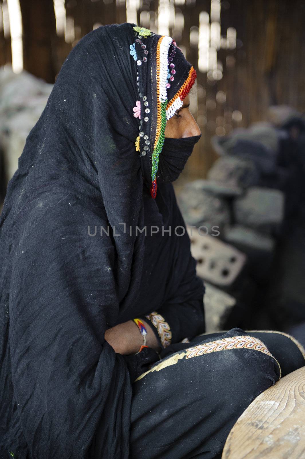 HURGHADA - JAN 30: veiling Bedouin woman sat in tent.Jan 30,2013 in Hurghada,Egypt.