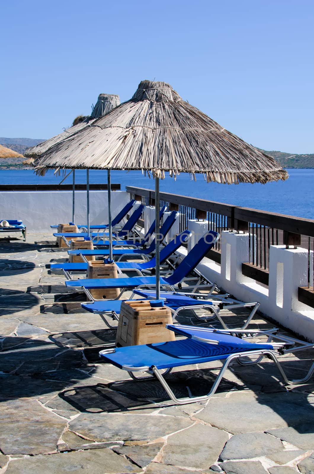 umbrellas and lounge chairs on the beach