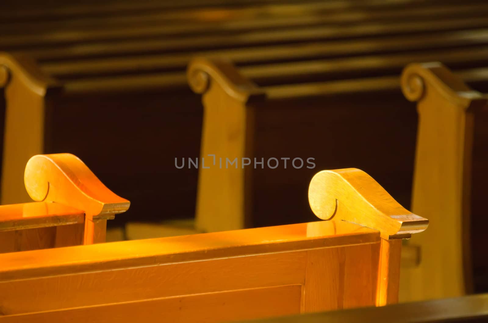 the wooden benches in a church