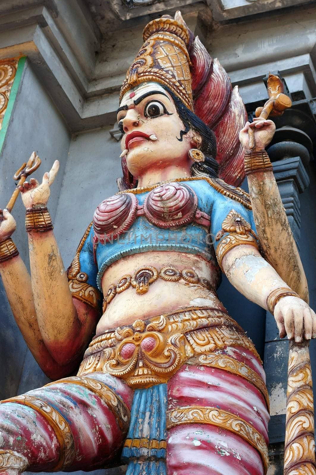 Ancient colorful Hinduism god sculpture in Sri Lanka