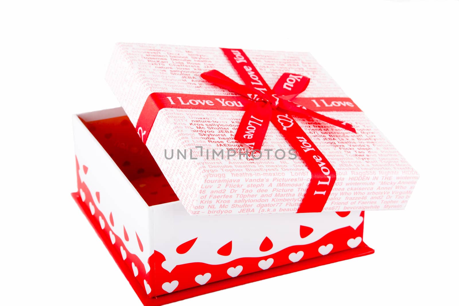 Bright red gift box on the isolated background