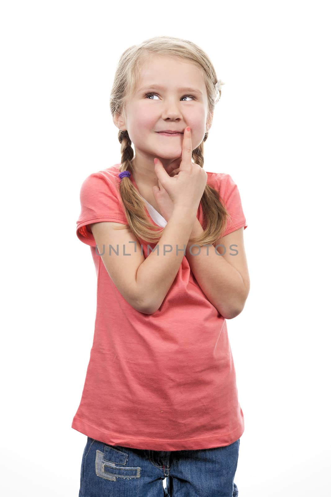 Pensive girl looking up on white background