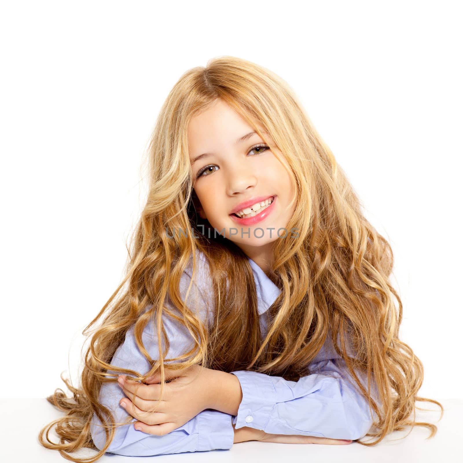 blond kid little student girl portrait smiling on a desk in white background