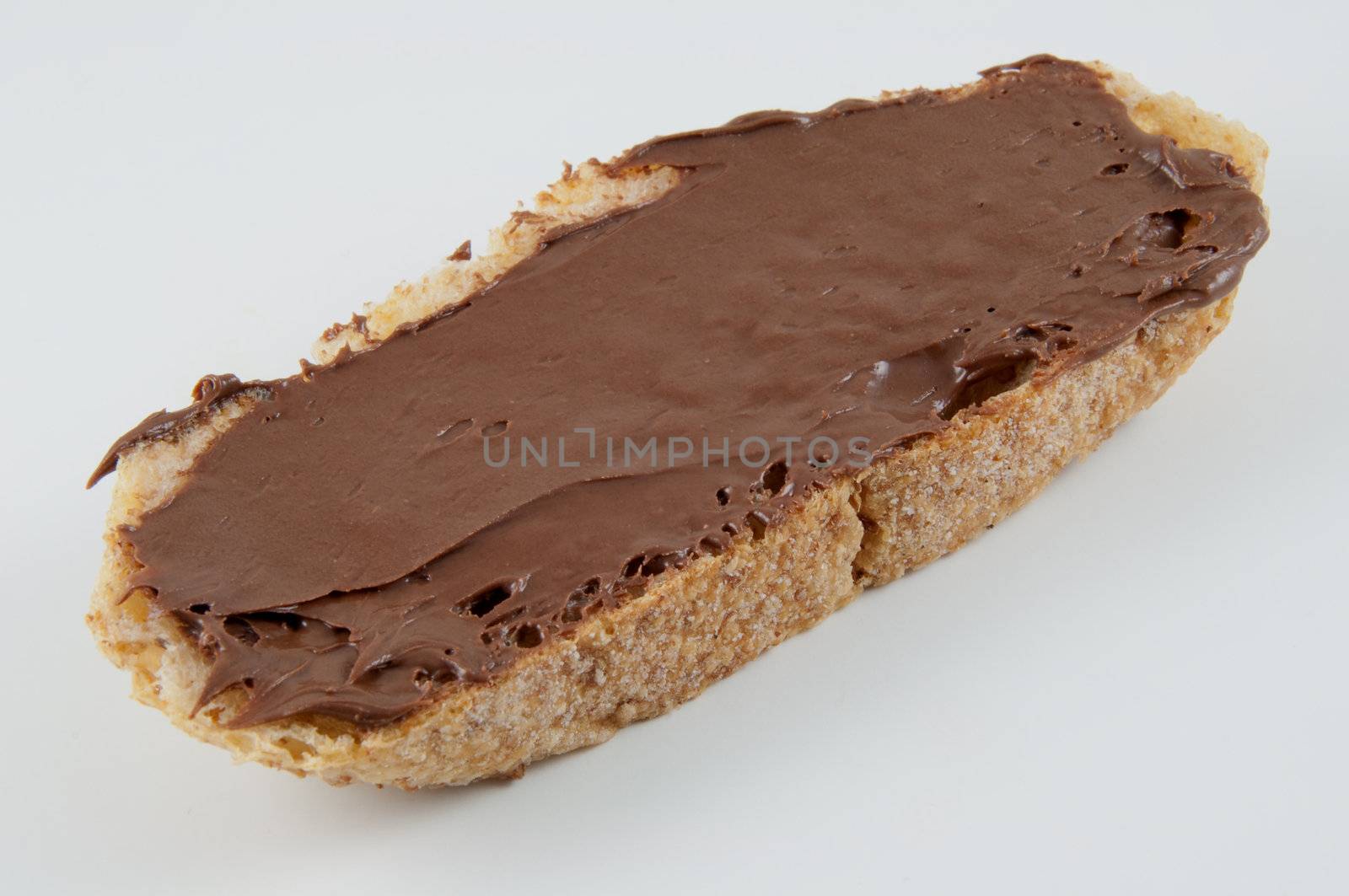 A toast with chocolate isolated on white.