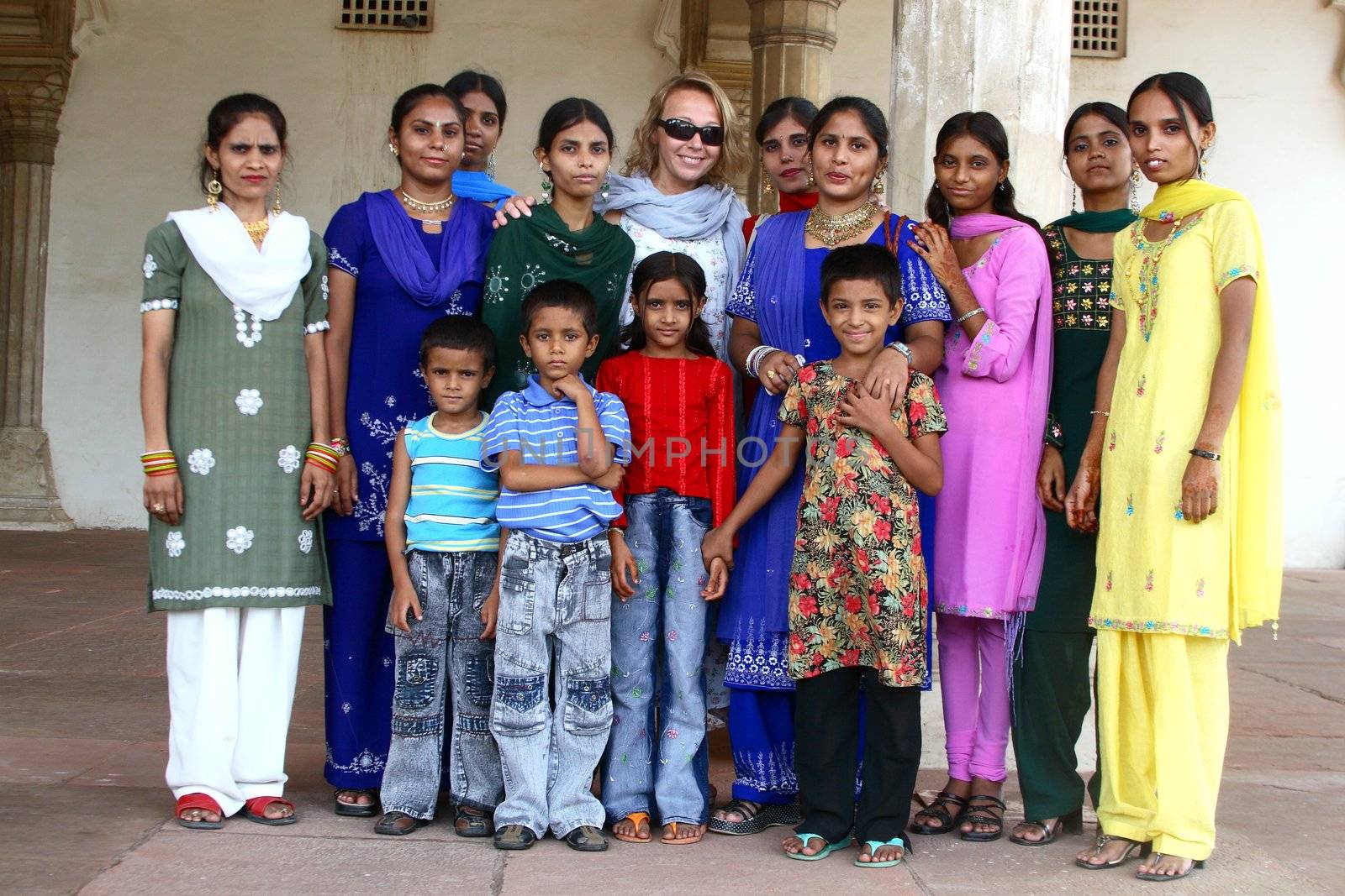 a group of asian people with european woman