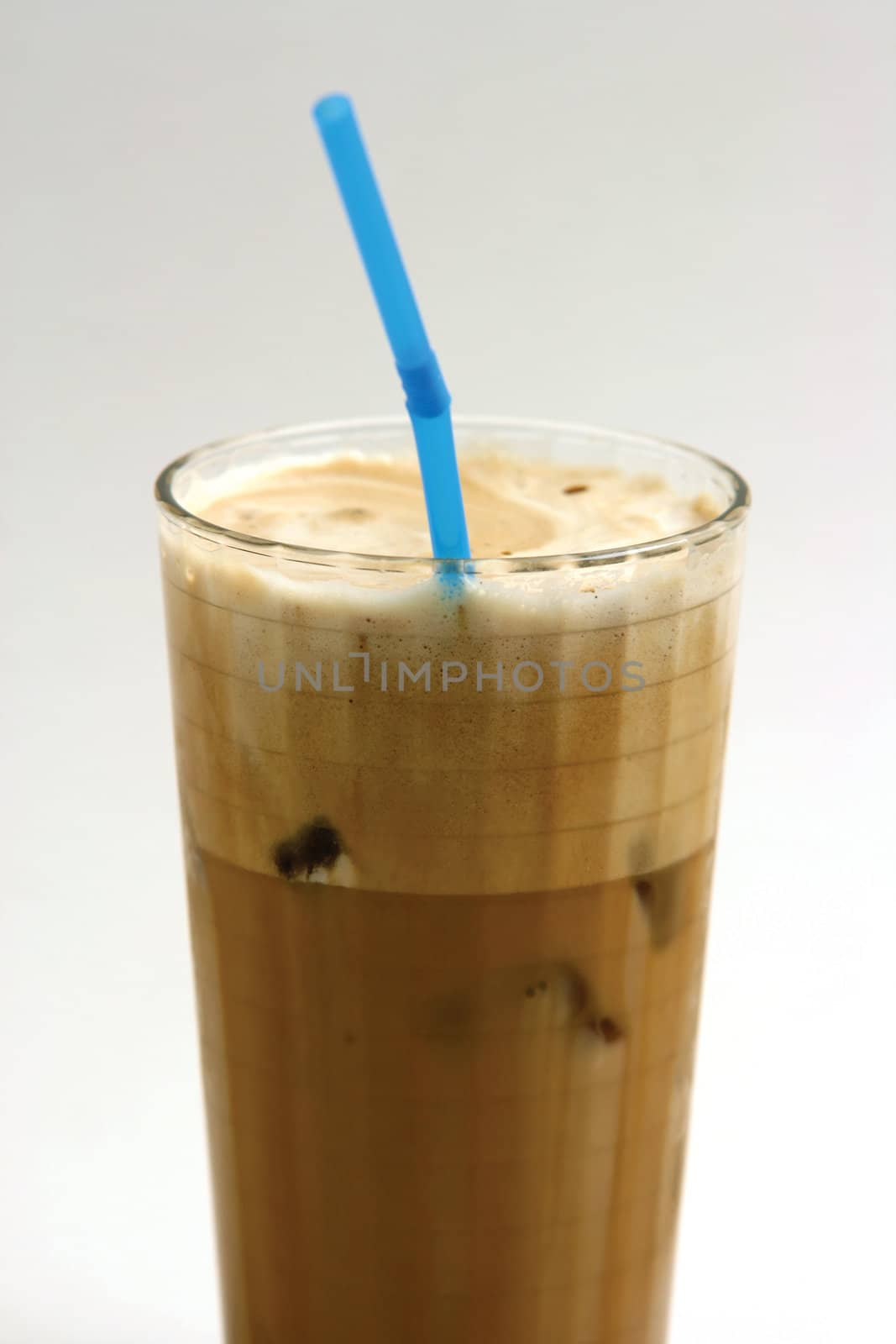 a glass of nice greek way ice coffee frape with milk