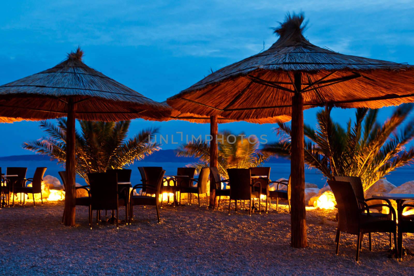 Umbrellas on Pebble Beach at Night, Brela, Croatia