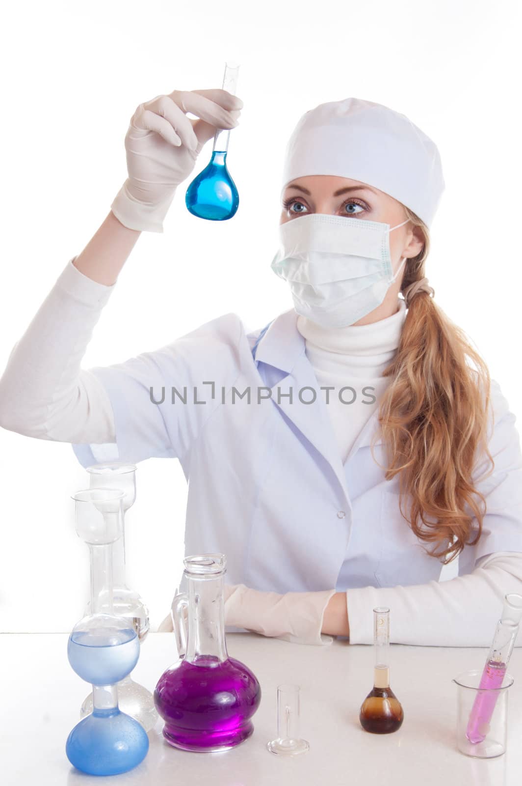 Scientist woman in lab coat with chemical glassware by Angel_a