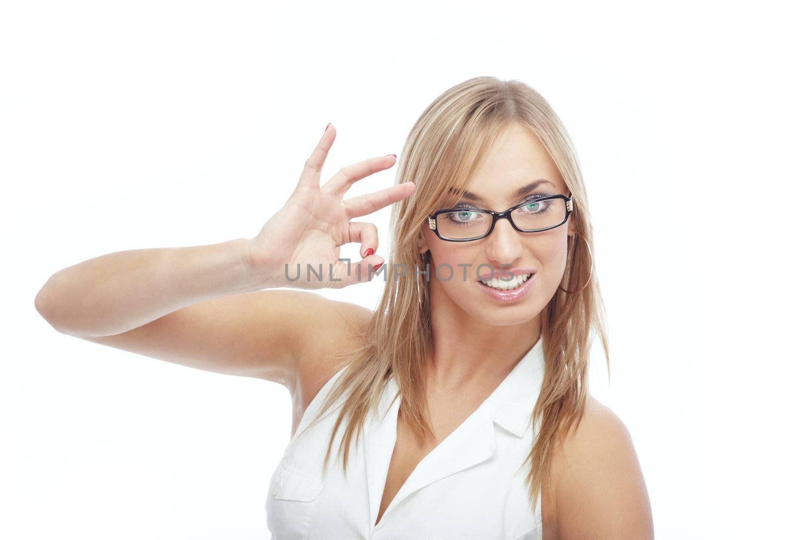 Smiling lady in spectacles and shirt making OK sign