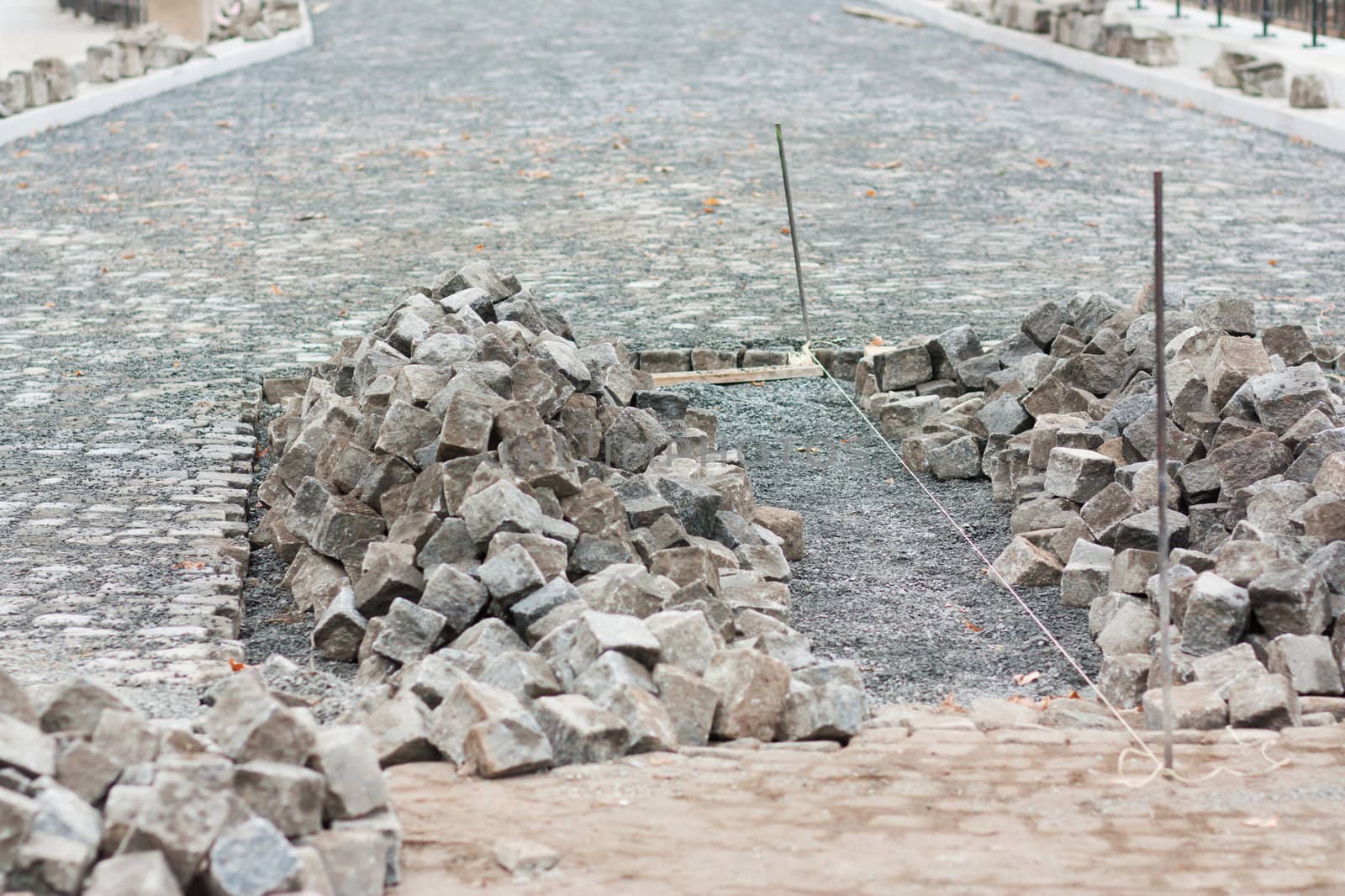 Installation of paved pedestrian way in city