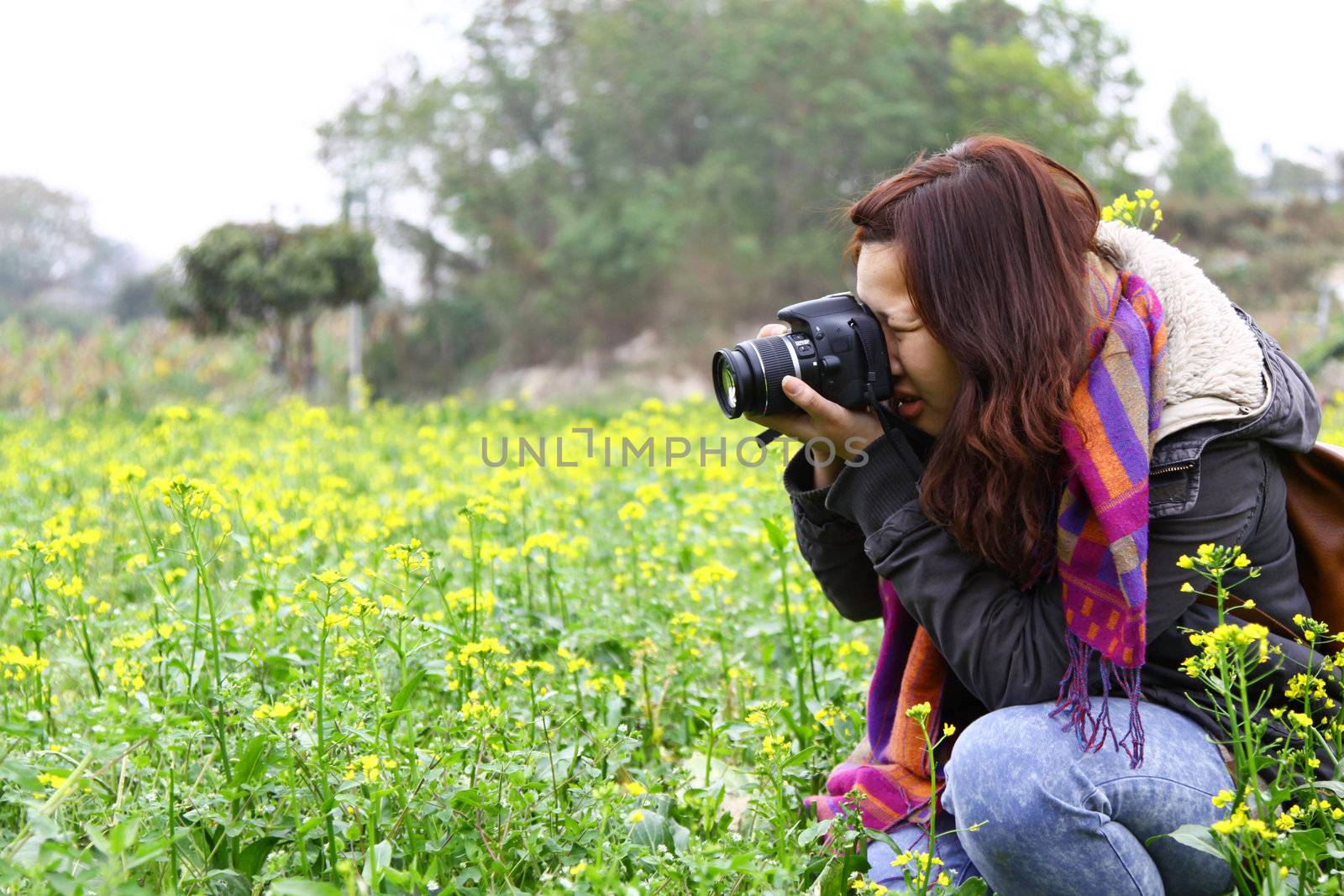 Female photographer on field