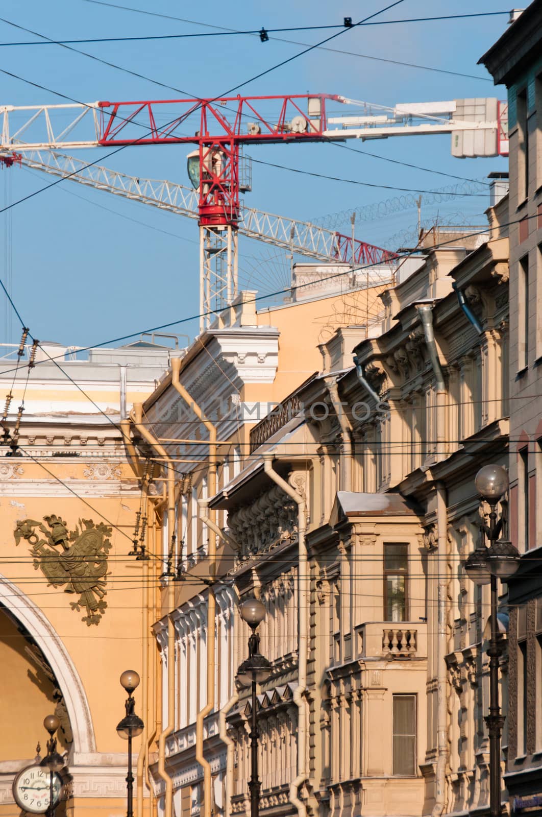 Colored cranes in the small city center at daytime