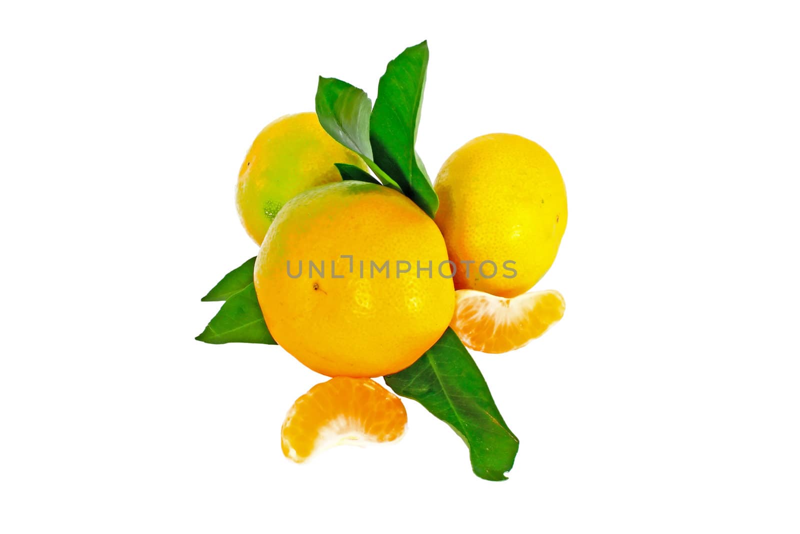 Three ripe mandarin with leaves isolated on white