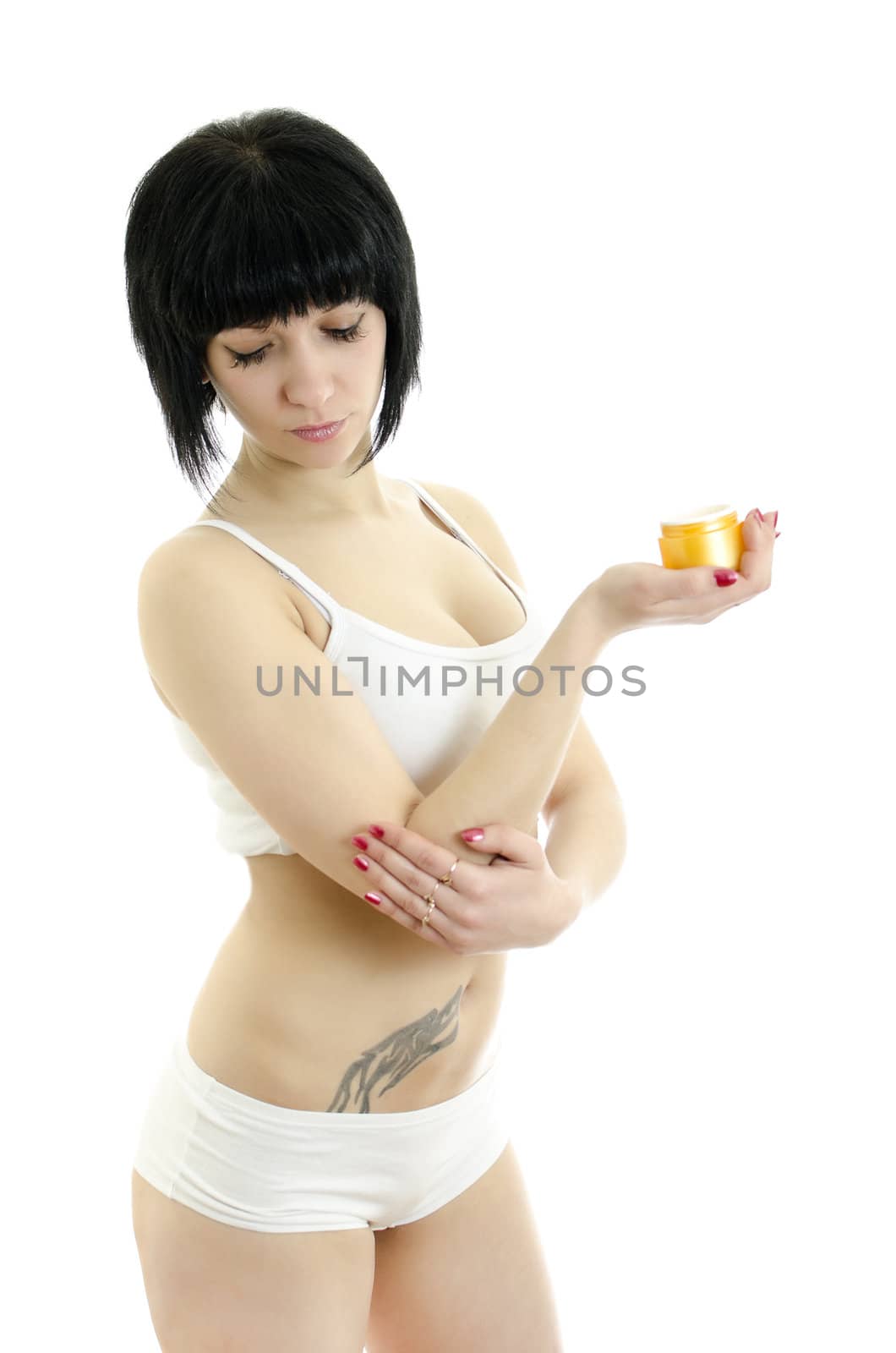 Woman with body cream. Isolated on white background