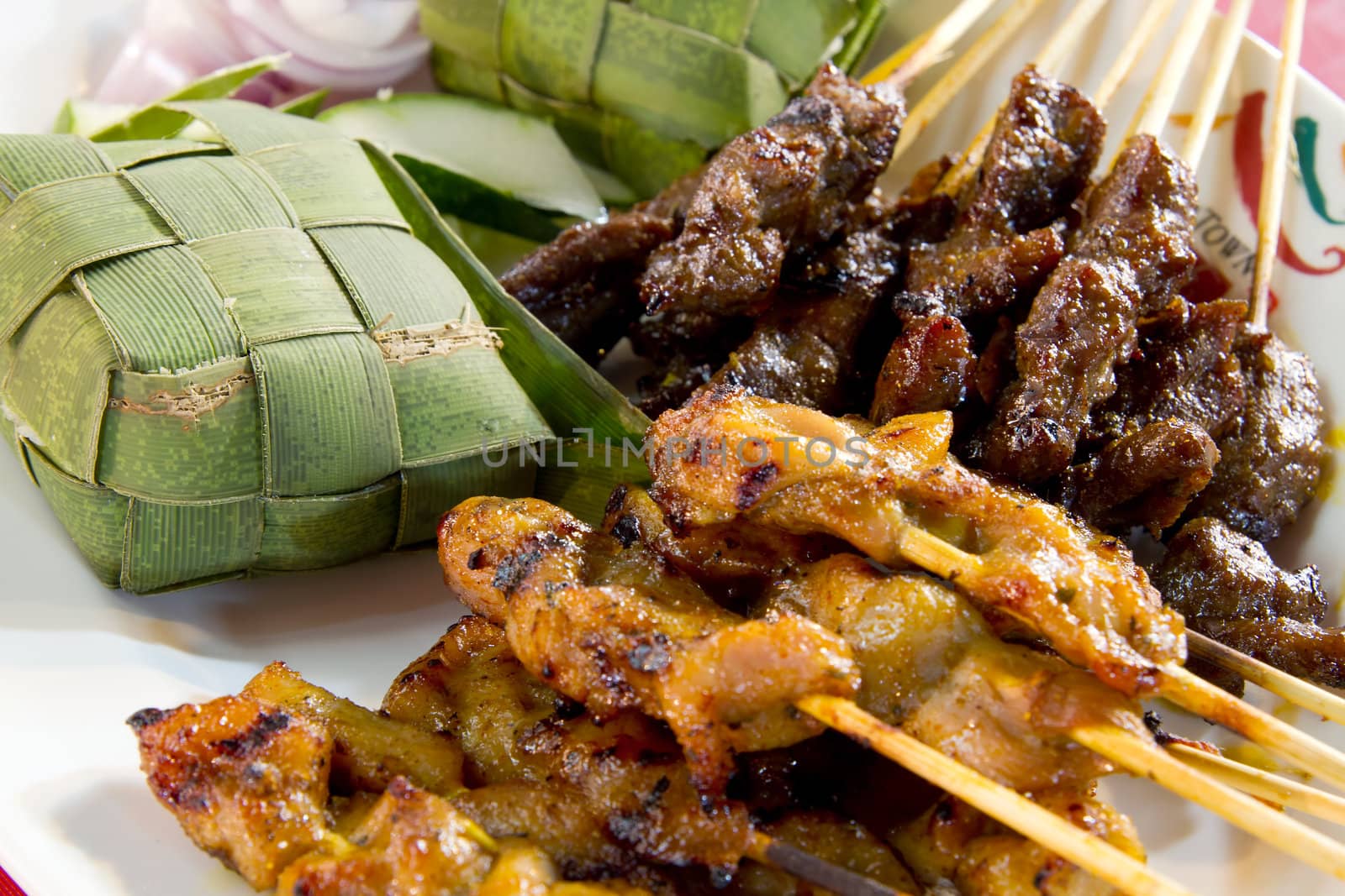 Chicken and Lamb Satay Skewers with Ketupat Rice Wrapped in Coconut Leaf