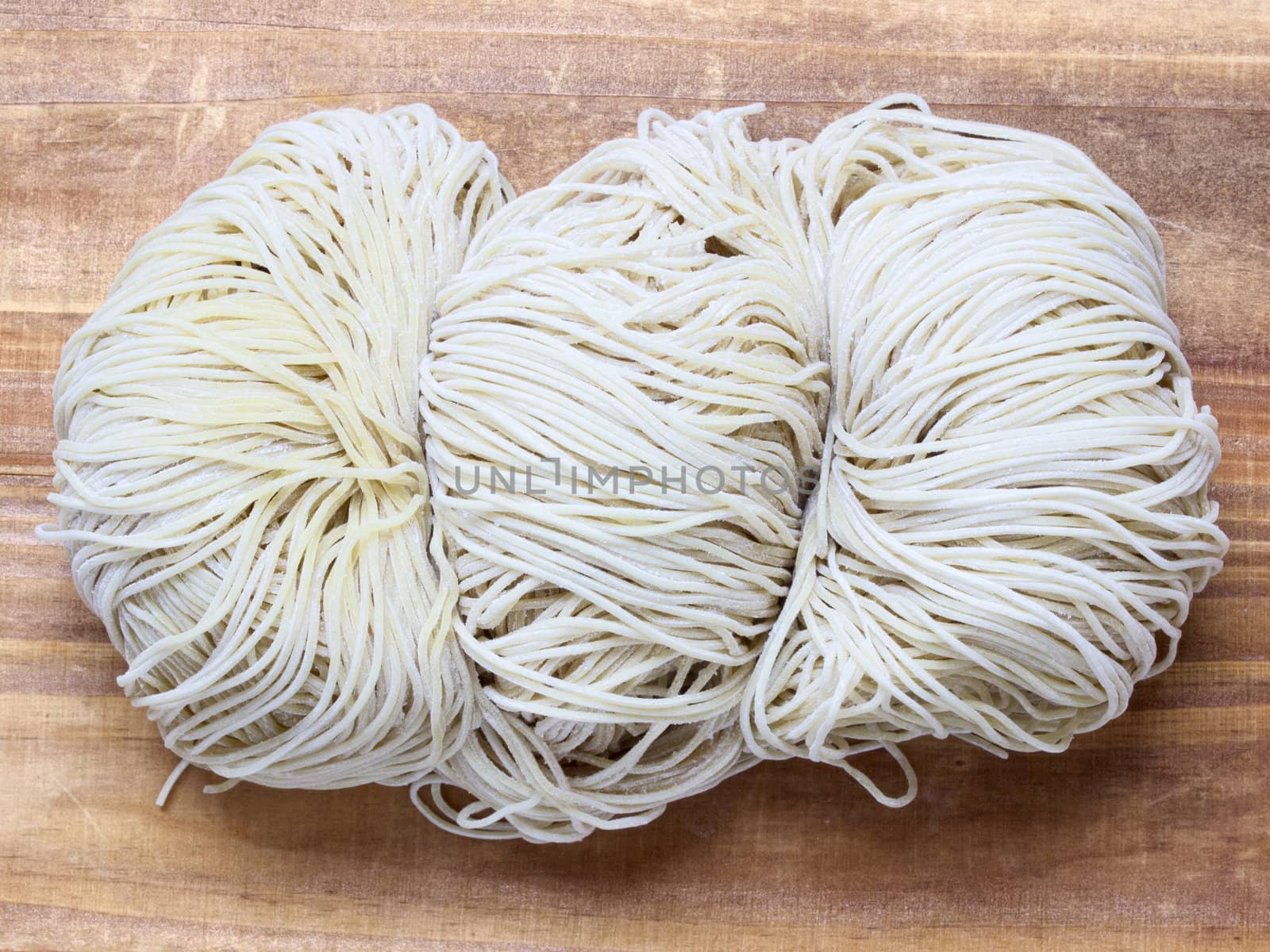 close up of freshly made raw egg noodles