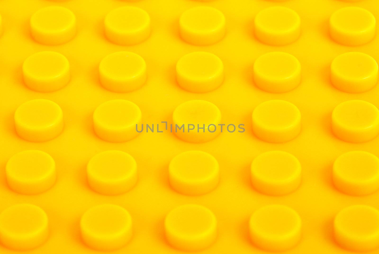 close-up yellow plastic construction background