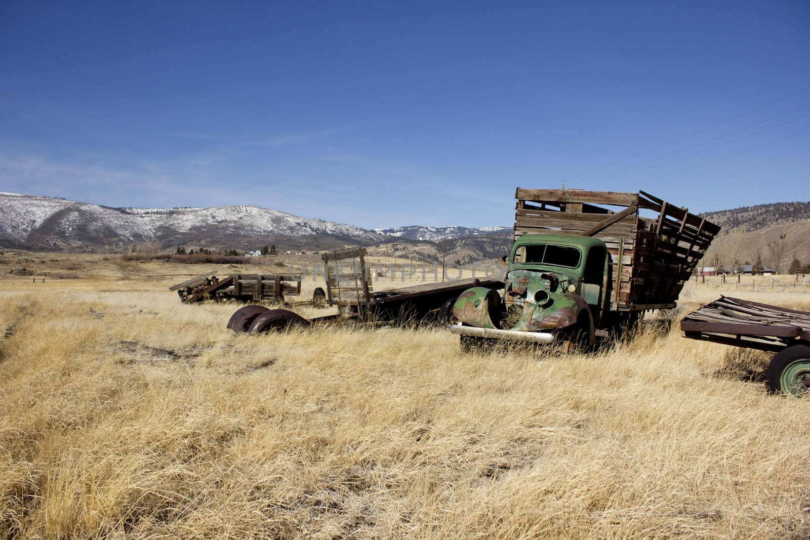 and old farm truck thats falling apart.