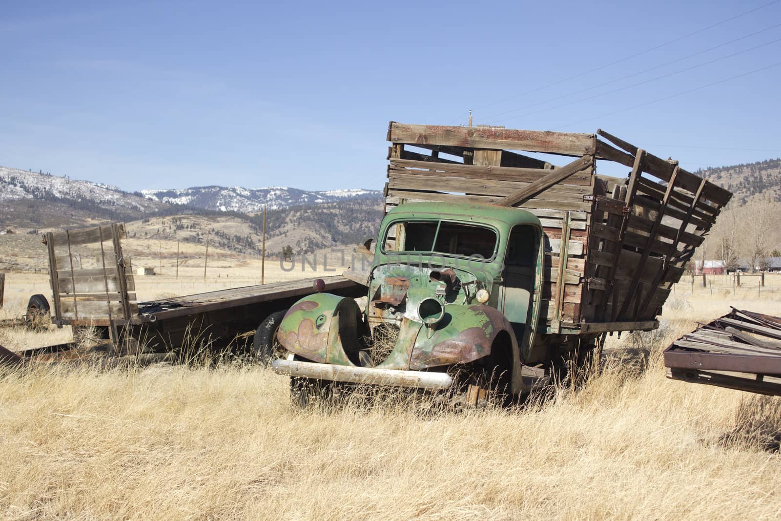 and old farm truck thats falling apart.