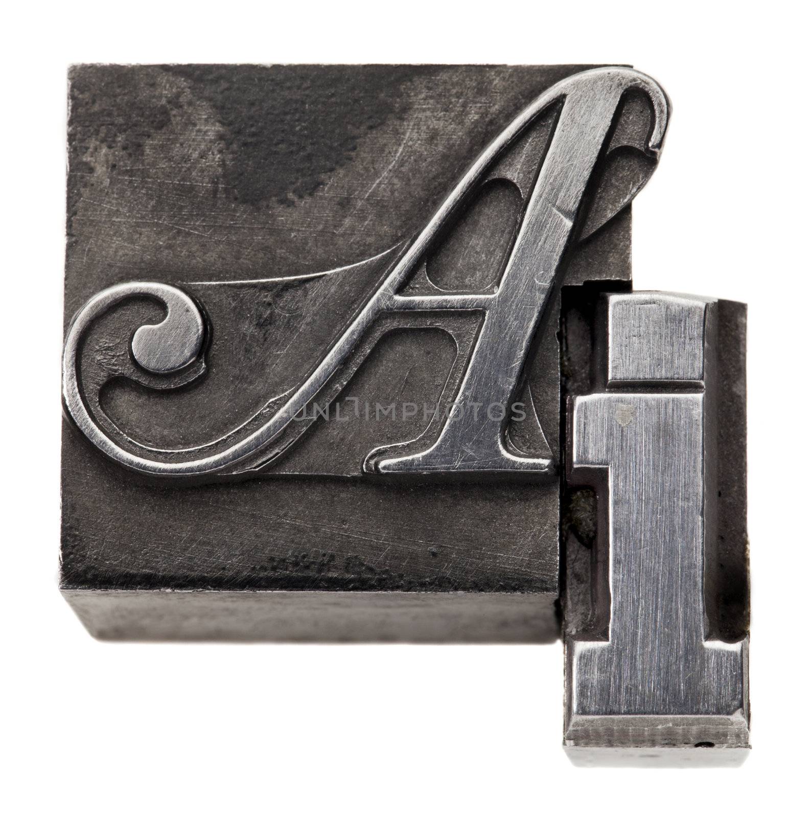 AI - artificial intelligence acronym - isolated vintage metal printing blocks