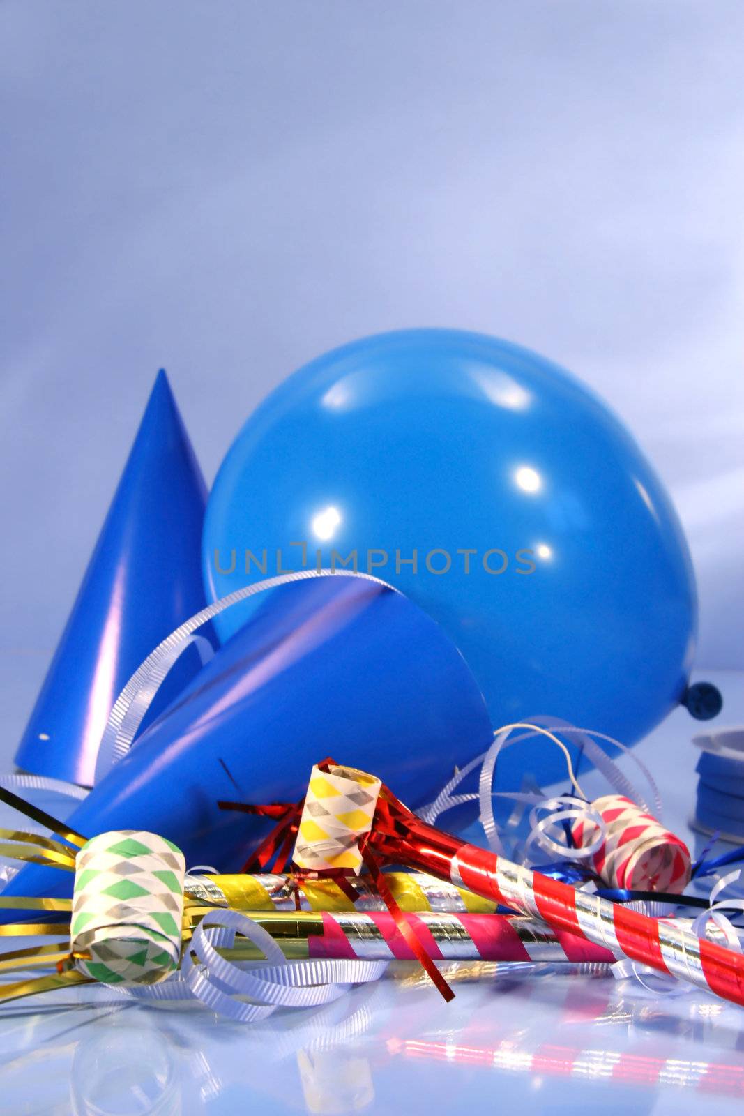 Party decorations with hats, ribbons and balloons