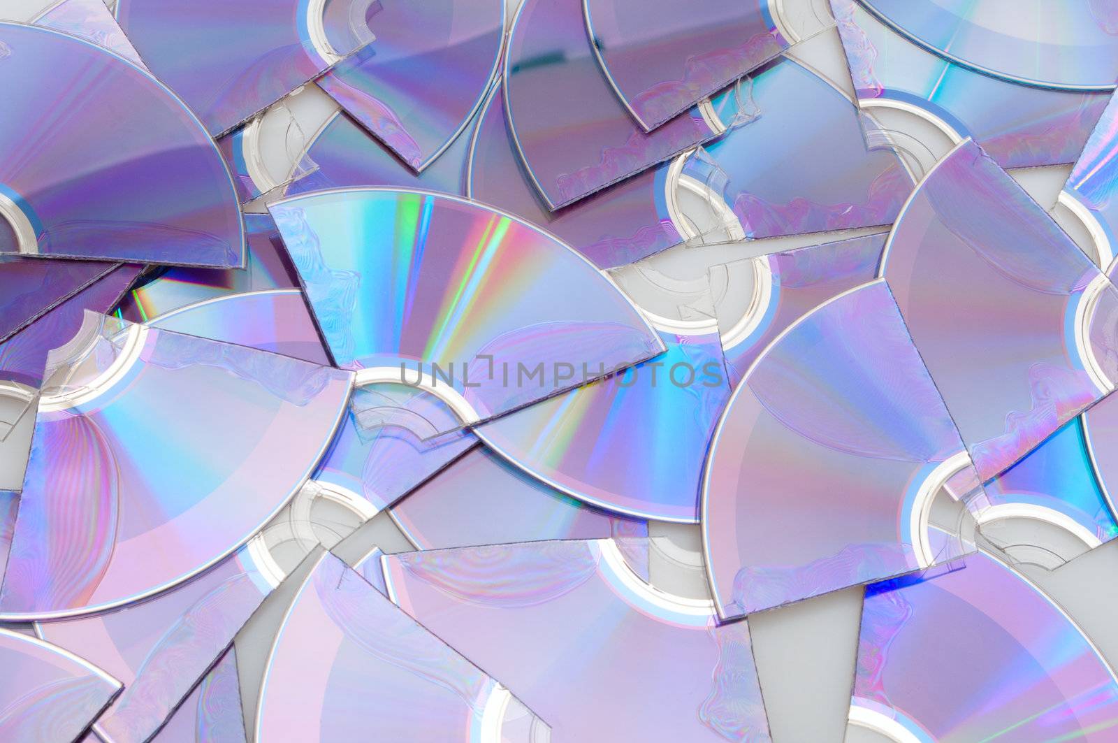 Background of Pieces of Broken CD Compact Discs
