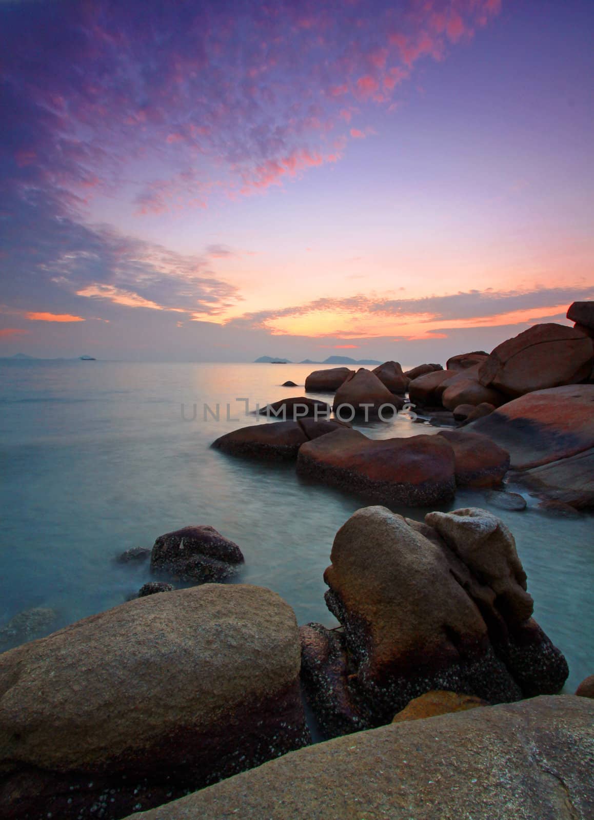 Sunset under long exposure along coast